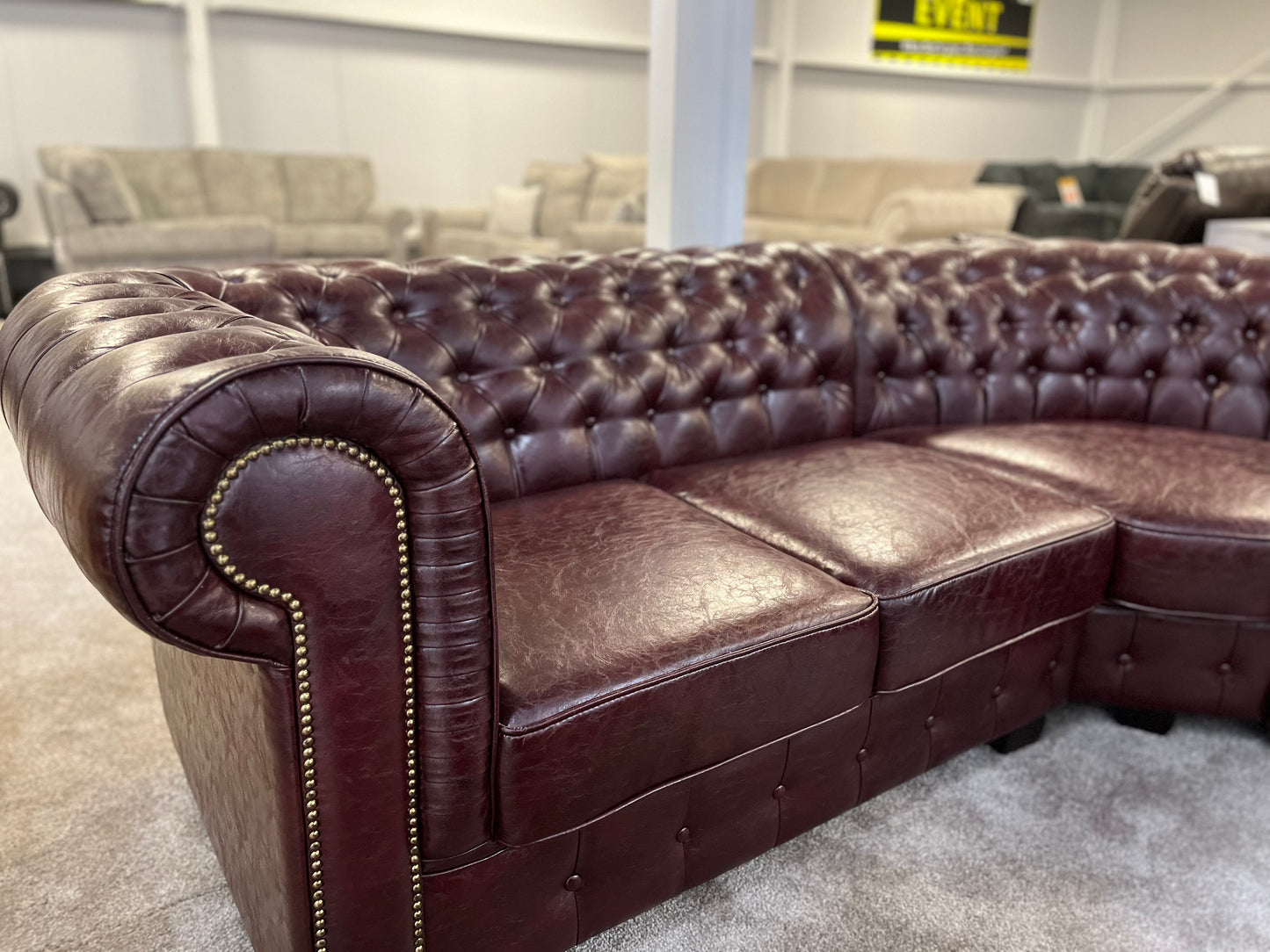 Chesterfield corner sofa with poof